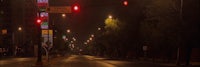 a street light is lit up at night